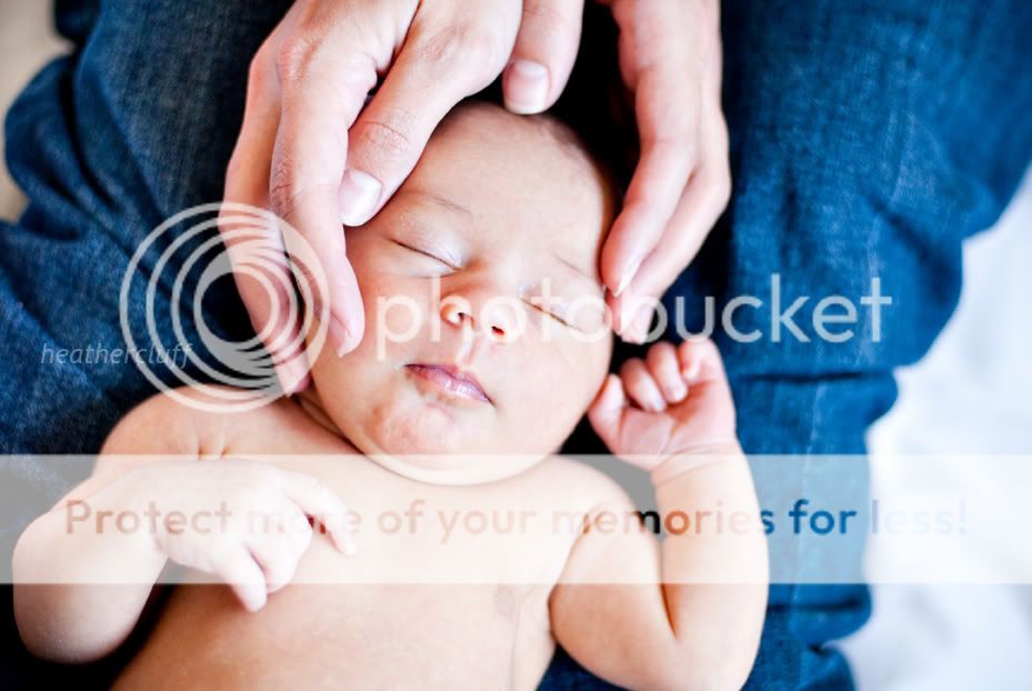 another of my brother's baby laying on mama.........